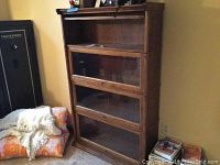 Full front view of barrister bookcase showing all four sections