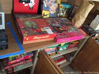 Game shelf with Bingomatik and various vintage board games and puzzles visible.