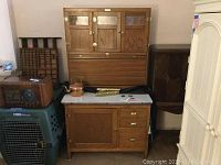 Front view showing full cabinet with accessories