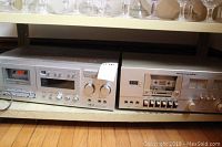 Akai GX M50 and Marantz MD350 cassette players side by side on shelf
