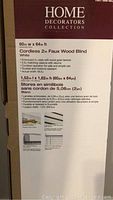 Photo of box packaging for two Home Decorators Collection cordless 2 inch faux wood blinds in white, showing detailed product specifications and features.