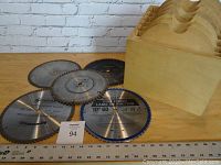 Lot of five 10 inch blades and wooden storage blade box shown on table with measuring scale for size reference