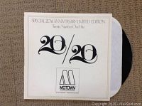 Front cover of the Motown 20th Anniversary 20/20 vinyl LP in white sleeve, with clear text and logo visible.