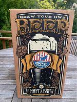 Front of the box showing Brew Your Own Beer kit with vintage beer graphic and American Pale Ale label