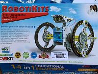 Front of the box showing 'ROBOKITS 14 in 1 Educational Solar Robot' with a photo of the robot and brand OWI.