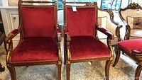 Two chairs side by side showing full fronts and overall design
