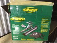 Original green and yellow cardboard box labeled YardWorks with product image and specifications.