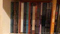 Shelf of slender paperback Christian and spiritual devotionals