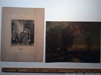 Photo showing two prints side by side: the older black and white etching on paper with visible age spots, and a colored oil landscape print.
