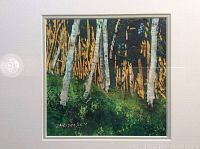 Full view of the framed watercolour painting showing a forest of birch trees with green underbrush in vibrant shades and the signature Zarowsky.