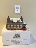 Porcelain Stoney Brook Town Hall building on top of the white foam protective box showing front and side details.