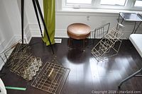 Overall lot arranged near window: stool, metal racks, glasses caddy, metal table