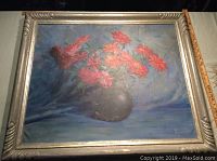 Front view of framed oil painting showing floral composition