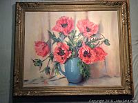 Framed oil painting showing red poppies in blue jug. View includes full artwork and frame.