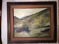 Full front view of framed painting showing abstract landscape scene.