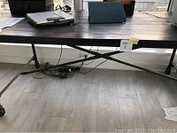 Rectangular wood top table with metal X-base
