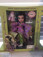 Bratz World Collector's Edition doll in original packaging wearing a purple and green kimono-style outfit