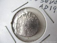 Obverse side of the silver denarius coin showing Emperor Septimius Severus profile