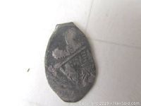 Front side of the silver Kopeck coin showing figure with spear and Cyrillic text