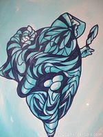 Close up of the blue and black abstract figure in the painting with a profile holding an object.