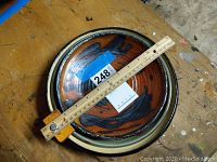 Top view of stacked plates with ruler showing 11" diameter