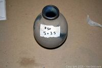 Top-down view showing overall shape, size label and unglazed stoneware body