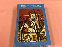 Front cover of the book The Rock And The Sword showing an illustration of St Andrews Presbyterian Church in Kingston and the title with author's name.