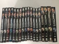 Spine view of 16 Perry Mason DVD cases showing all seasons with CBS logo.