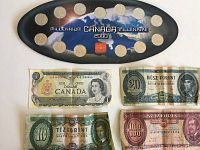 Blue oval plaque containing 16 Canadian coins surrounding a Canada map with 'Millennium 2000' text.