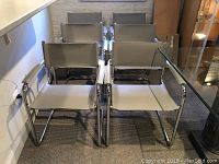 Front view of all six chairs grouped together