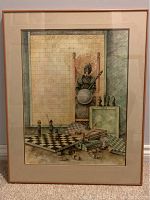 Framed surrealist art print leaning against wall showing style, colors, and condition