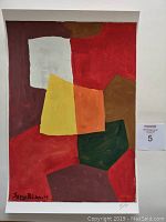 Frontal photo of abstract color block lithograph signed Serge Poliakoff in bottom left, numbered 5/5 in bottom right corner.