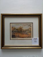Full view of the framed lithograph print 'Haymaking at Cherrydale' showing gold frame and cream matting.