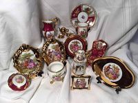 Photo showing the collection of porcelain miniatures including teapots, creamer, tray, teacup, planter, serving bowl, tea warmer, and Victorian decorative items