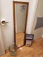 Full setup of all items showing mirror, vase, candle holders in box, and wolf picture.