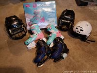 Lot contents showing three helmets and four skates (two girls adjustable with rollerblade attachments and two black boys/unisex skates).
