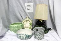 Image shows three vintage green ceramic items: a dark green lamp with beige shade, a large light green textured ceramic mug or planter, and a smaller marbled green wall planter with hanging hole. White backdrop used.