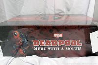 Deadpool LootCrate box front showing branded packaging with Deadpool character art and title.