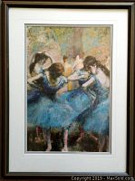 Full view of the framed poster showing four ballerinas in blue tutus dancing, with background of trees and light.