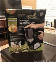 Box packaging showing image and branding of Presto Professional Salad Shooter electric slicer shredder