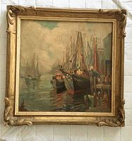 Full view of framed oil painting showing harbor scene with ships