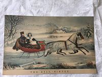 Full view of the lithograph print 'The Road - Winter' showing horse-drawn sleigh with man and woman against snowy landscape background.