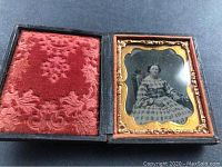 Mini Tin Type Victorian frame open showing velvet interior and tin type photograph with gold-tone decorative edging.