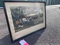 Framed fox hunt lithograph print titled 'Gone Away' showing the whole artwork and frame in outdoor lighting.