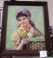 Full front view of the framed painting showing the woman holding a basket of grapes.