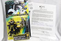 Photo shows sealed Batman Forever Night Hunter Batman action figure in original blister packaging with claw glider wing and night vision goggles and official Certificate of Authenticity from George Barris.