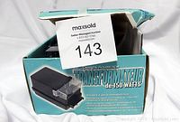 Photo showing the box of the Aquascape 150 Watt Transformer with product image and multilingual text describing features.