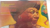 Close-up of front cover art showing stylized portrait of Ella Fitzgerald and album title