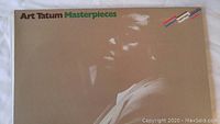 Front cover of 'Art Tatum Masterpieces' double vinyl album featuring silhouette photo of Art Tatum and Tamla Motown branding.