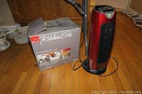 Regal Kitchen Pro breadmaker box and Living Solutions ceramic oscillating heater on wood floor